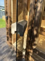 Brown-painted L Box sauna with window in front wall - Image 3